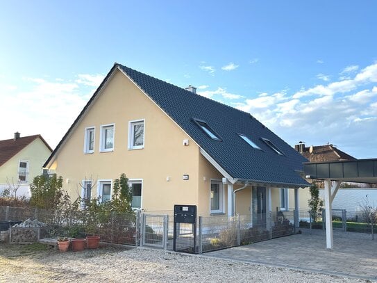 Exklusive 3 Zimmer Wohnung mit 2 Bäder, Garten, großer Balkon, 2 Stellplätze mit Wall-Box Anschluss und Keller Ersatzra…