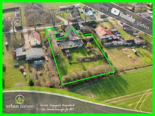 Modernes Wohnen mit Mietpotenzial: Geräumiges 2/3 Haus mit idyllischem Garten und Einliegerwohnung