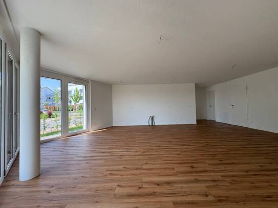 Modernes Wohnen im Neubau - 3-Zimmer-Wohnung mit Gartenanteil in naturnaher Lage