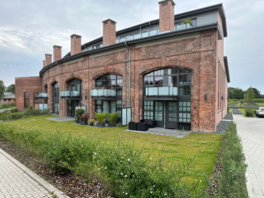 Einzigartig - Terrassenwohnung mit viel Licht und eigenem Gartenanteil - KfW-Effizienzhaus