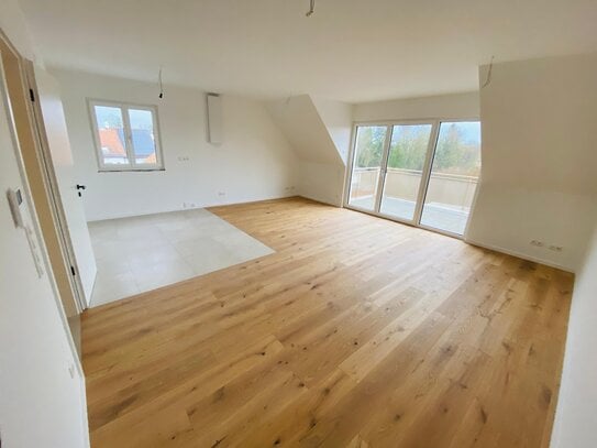 Erstbezug! Hochwertig ausgestattete Dachgeschosswohnung mit Balkon, Tiefgarage und vieles mehr!