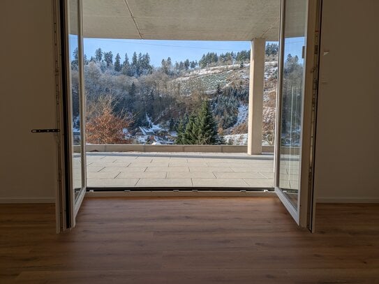 Moderne Einliegerwohnung mit überdachter Terrasse – Neubau / Erstbezug