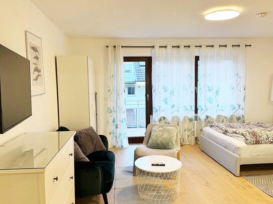 1-Zimmerwohnung mit Wlan, TV, Küche, Walk-In Dusche/WC, Waschmaschine, Balkon und Parkplatz