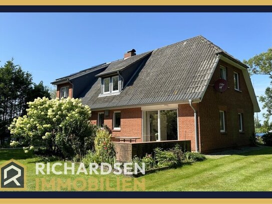 Geräumiges Einfamilienhaus auf einem idyllischen Grundstück in Ortsrandlage mit Weitblick