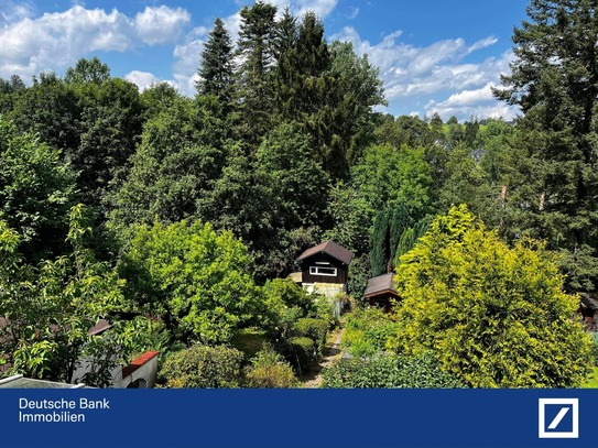 Eine Gartenoase mit einem charmanten Einfamilienhaus im Ortskern von Eitorf. Herzlich Willkommen!