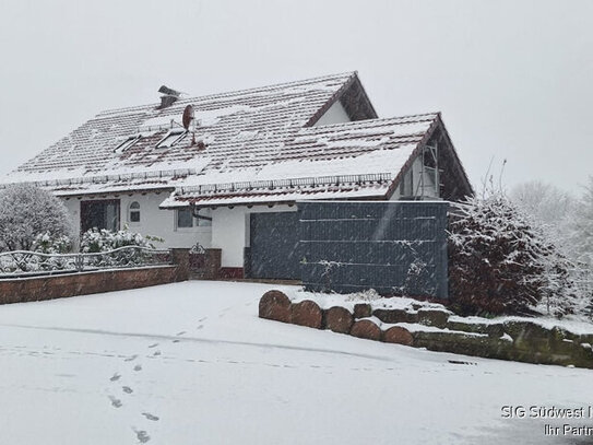 Charmantes Einfamilienhaus mit Aussicht und Garten Ihr perfektes Zuhause für unvergessliche Momente