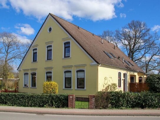 Erdgeschosswohnung mit Garten und Garage.