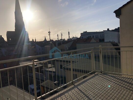 Frisch renovierte 4- Zimmer- Dachgeschosswohnung am Capitol mit Blick auf den Schweriner Dom