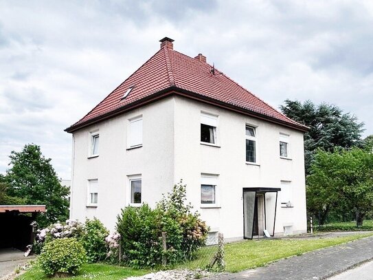 Solides, freistehendes Zweifamilienwohnhaus mit tollem Garten!