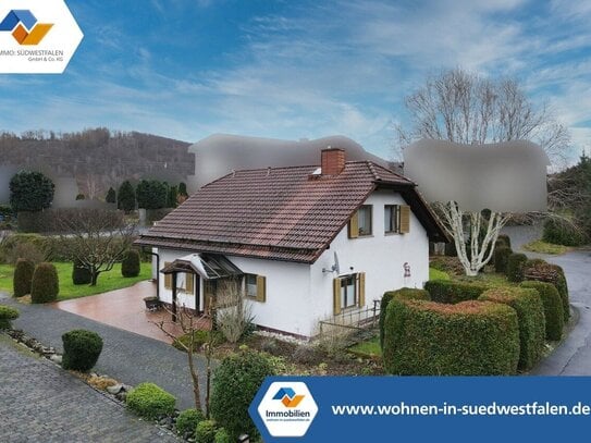 VR IMMO: Gemütliches Einfamilienhaus mit großer Terrasse und Doppelgarage in Burbach-Wahlbach!