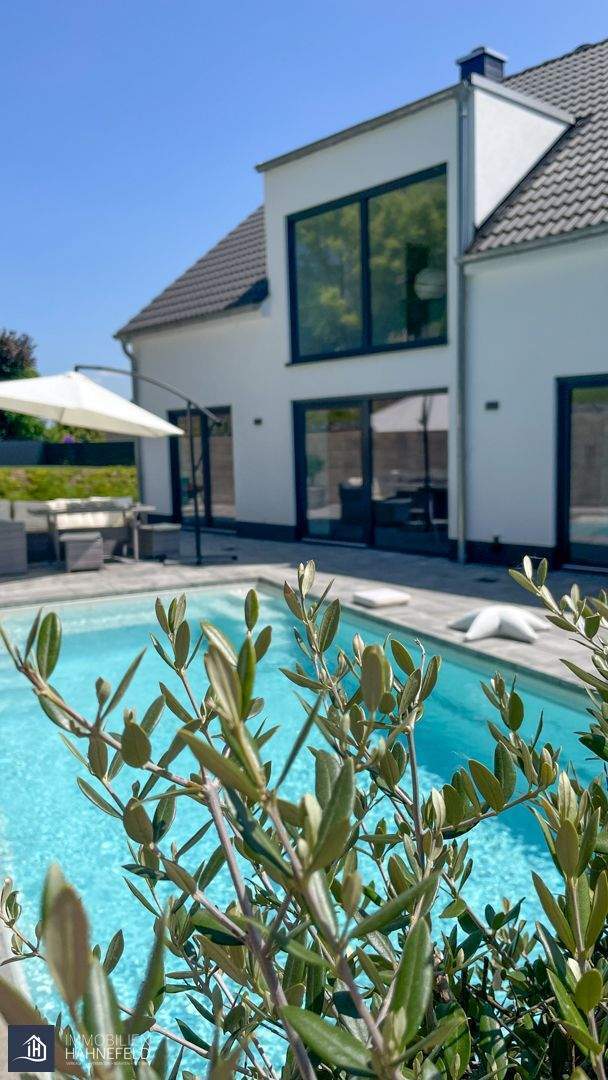 Immobilie in Gückingen - Modernes Einfamilienhaus mit Poolanlage und hochwertiger Ausstattung. - Bild 0