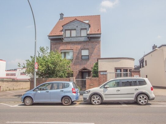 Vielseitige Immobilie: Modernes 2-3 Familienhaus mit angeschlossener Werkstatt und Büro