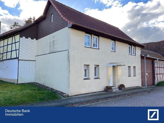 Wohnhaus und Nebengebäude aus Bankverwertung