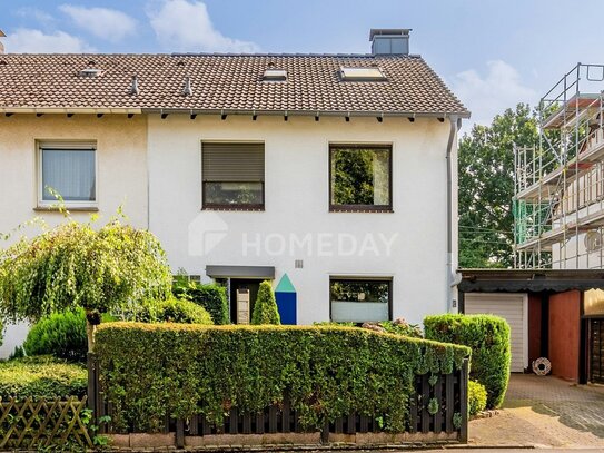 Charmante Doppelhaushälfte mit Wintergarten, Terrasse und Garten sowie einer Garage in ruhiger Lage