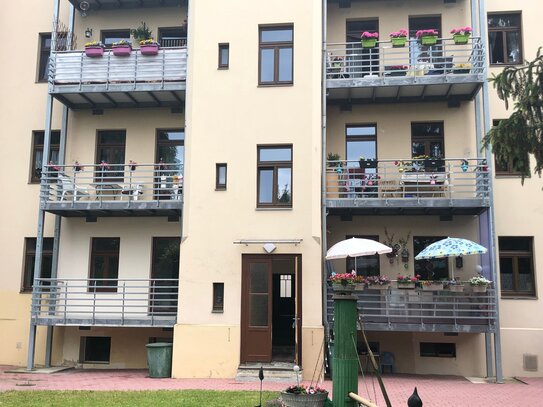 EG - WE mit großem Balkon ins Grüne in Zentrumsnähe