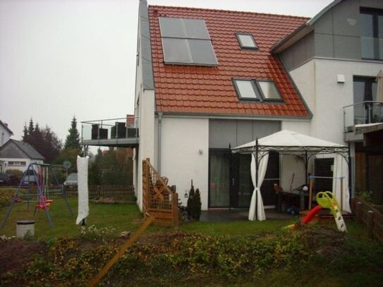 Erdgeschosswohnung mit Terrasse und Gartenanteil im Niedrigenergiehaus.