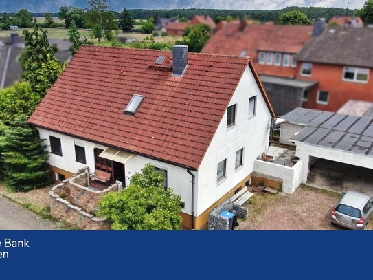 Einzigartige Wohngelegenheit in Helstorf - Einfamilienhaus mit großer Garage für vier Autos