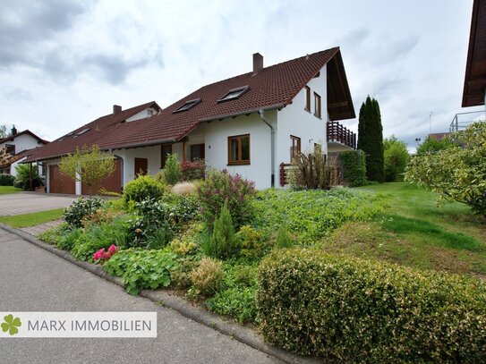 Ein liebevoll gepflegtes Einfamilienhaus - mit Traumgarten - und - viel Platz für die Familie