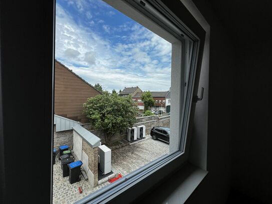 Lichtdurchflutete 2 Zi. Wohnung mit riesiger Dachterrasse in TOP-Wohnlage von Bardenberg.