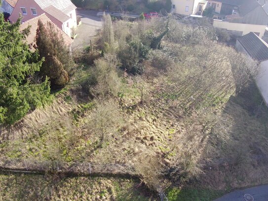 Ihr Eigenheim in der Natur: Großes Grundstück in Wollbach zu verkaufen