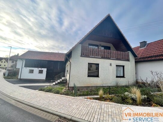 Einfamilienhaus am Bach mit Nebengebäude, Garagen und großem Gartengrundstück in 97657 Schmalwasser!