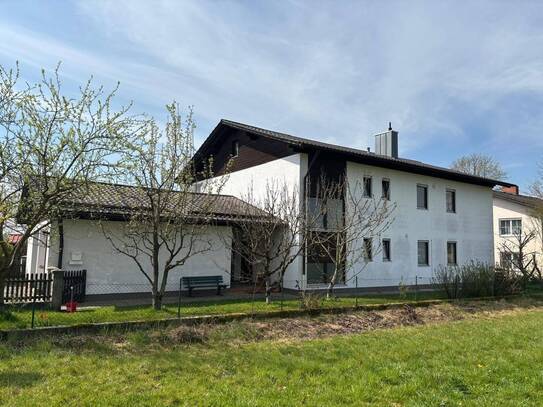 Geräumige 4-Zimmer Wohnung im 1.OG in ruhiger Siedlungslage mit Garage und Gartenanteil