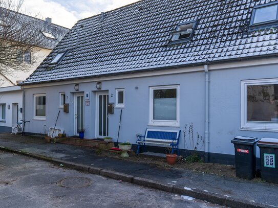 Vermietetes Reihenendhaus mit Garten in Innenstadtnähe