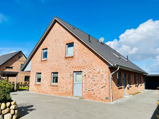 Moderne Doppelhaushälfte mit Carport an den Wiesen in Klanxbüll