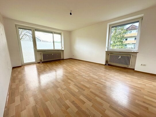 Helle & gepflegte 2-Zimmer-Wohnung mit eigenem Garten, Terrasse & großem Südwestbalkon, ca. 77,8 qm im Erdgeschoss