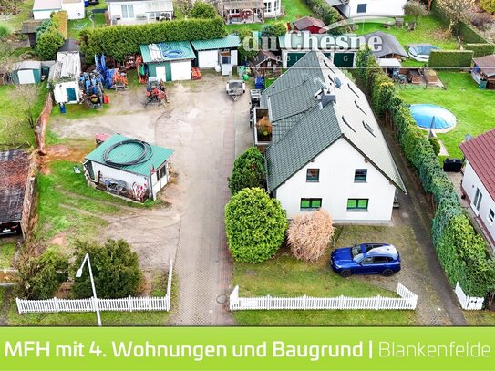 Mehrfamilienhaus mit 4 Einheiten und Baugrundstück