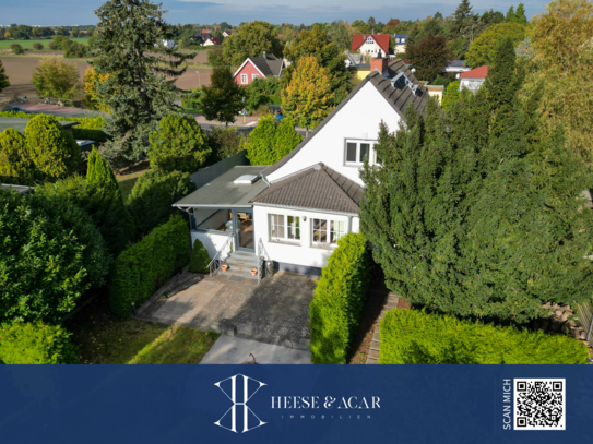 Einfamilienhaus mit Garage auf großem Grundstück - Potenzial zur Erweiterung