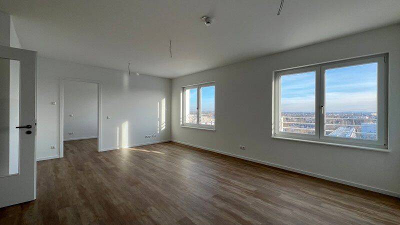 Penthouse mit Potential - Erstbezug. - Foto 1