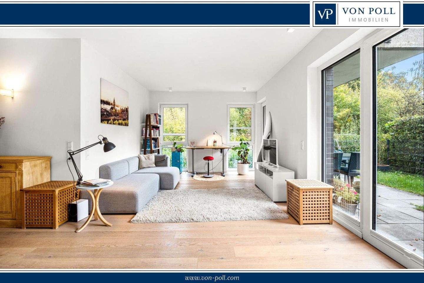 Elegante Erdgeschosswohnung mit Terrasse und Gartenanteil