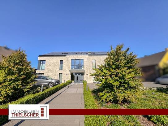 Moderne Zwei-Zimmer-Wohnung im KfW-40-Plus-Haus mit Balkon und Stellplatz in Heinsberg-Karken