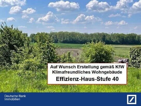 Hochwertige Neubauwohnung mit Gartenanteil in unverbauter Südlage