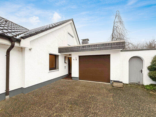 Großzügiger Bungalow mit wunderschönem Garten, Einzelgarage und optionaler Einliegerwohnung