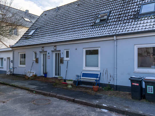 Preisreduzierung! Vermietetes Reihenendhaus mit Garten in Innenstadtnähe