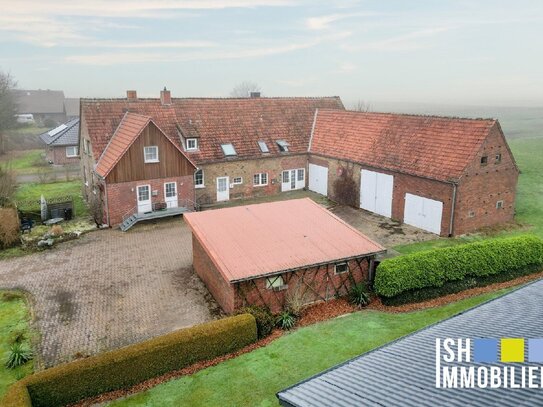 Ländliches Mehrfamilienhaus mit 4 Einheiten in ruhiger Lage