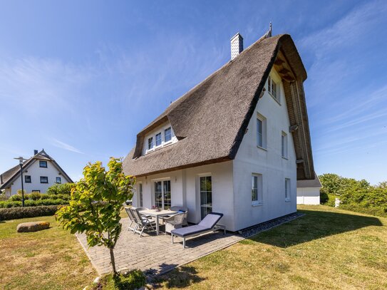 Reetgedecktes Ferienhaus mit Meerblick