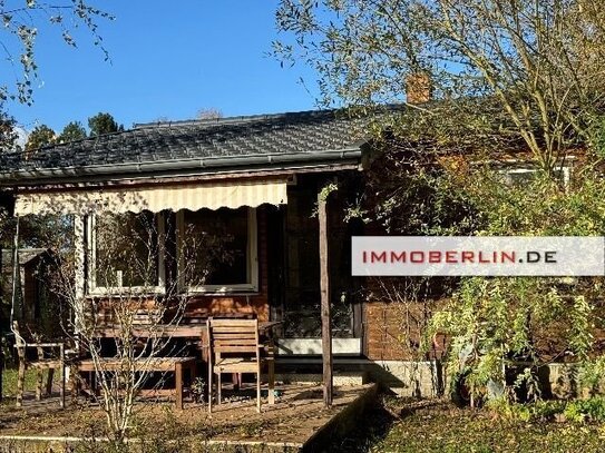 IMMOBERLIN.DE - Hübscher Gartenbungalow auf Eigenland in Tiergartensiedlung Oranienburg