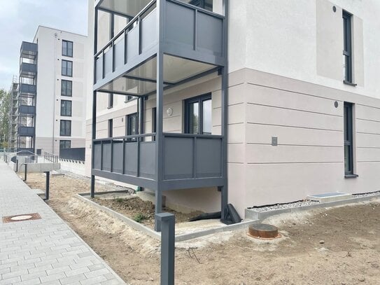 Neubau! 3-Zimmer-Wohnung mit Einbauküche, Tiefgaragenstellplatz und Südbalkon in Rostock-Groß Klein