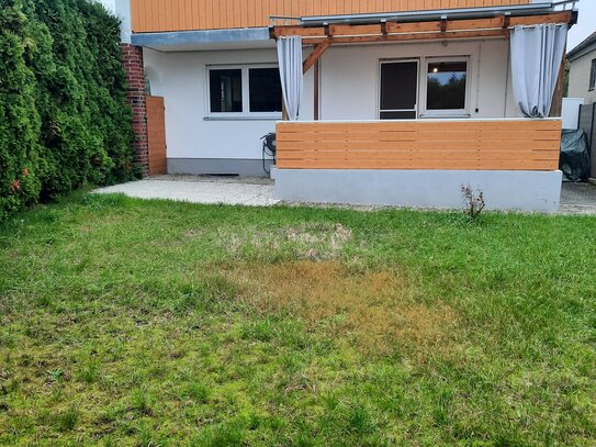 Gepflegte 2 ZKB Wohnung mit Terrasse und Garten