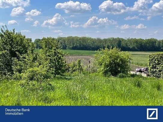 Hochwertige Neubauwohnung mit Gartenanteil in unverbauter Südlage