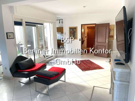 3 Zimmer Wohnung in Grunewald mit umlaufender sonniger Terrasse, großen Fensterfronten sowie Garage