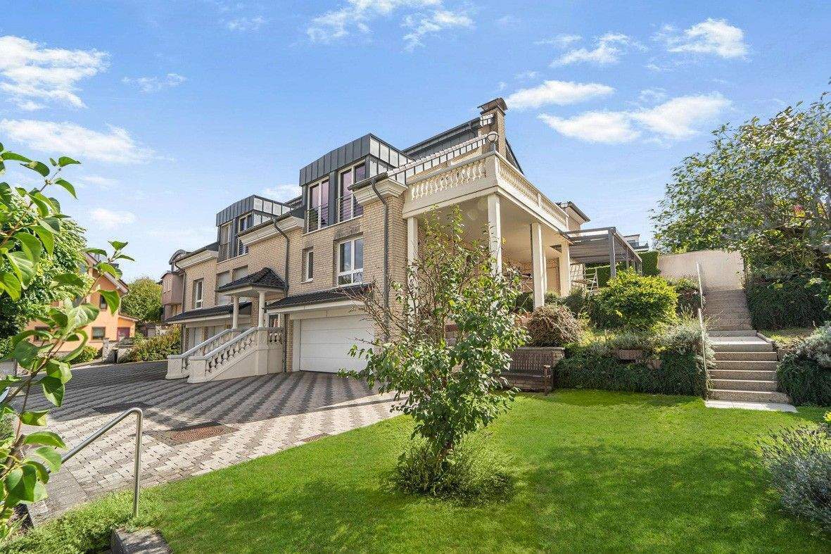 Licht, Luft & Lebensgefühl! Hochwertige "Haus-im-Haus"-Wohnung in Burgaltendorf - bezugsfrei