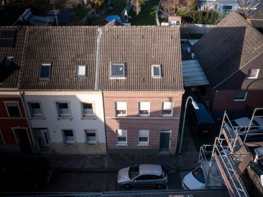 Charmantes Reihenendhaus mit großem Potenzial, Garten und Vermietungsoptionen