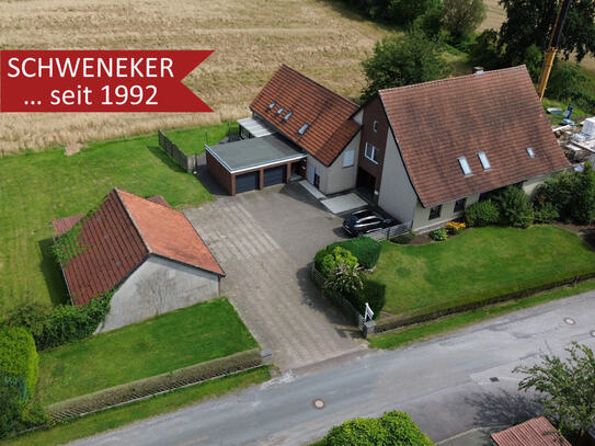 Ländliches Wohnen mit Weitblick! Großzügiges Dreifamilienhaus in Bünde-Dünne!