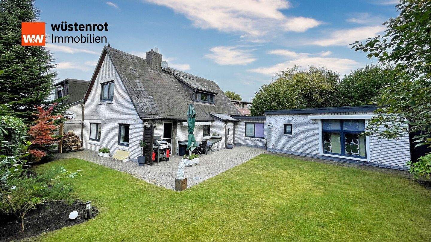 Schöne Wohnung im Stile eines Hausanbaus mit tollem Grundstücksanteil in gefragter Lage von HH-Poppenbüttel