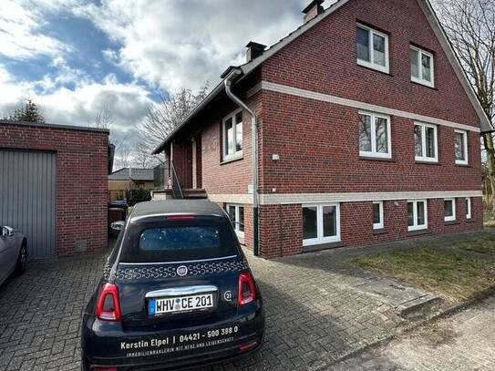 3-Zimmer Hochparterrewohnung in ruhiger Sackgassenlage mit Terrasse, großem Garten und neuer Küche!