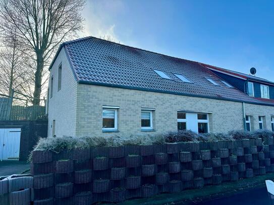 Sanierte Erdgeschosswohnung mit Terrasse - Ihr neues Zuhause in ruhiger Lage nahe der Küste